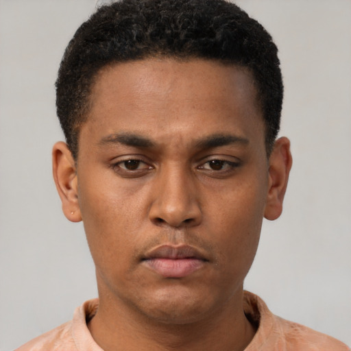 Neutral latino young-adult male with short  brown hair and brown eyes