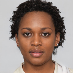 Neutral black young-adult female with short  brown hair and brown eyes