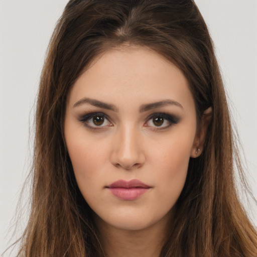 Neutral white young-adult female with long  brown hair and brown eyes