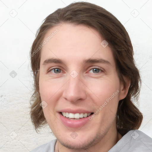 Joyful white young-adult female with medium  brown hair and blue eyes