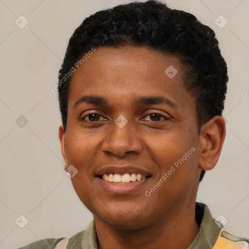 Joyful black young-adult male with short  black hair and brown eyes