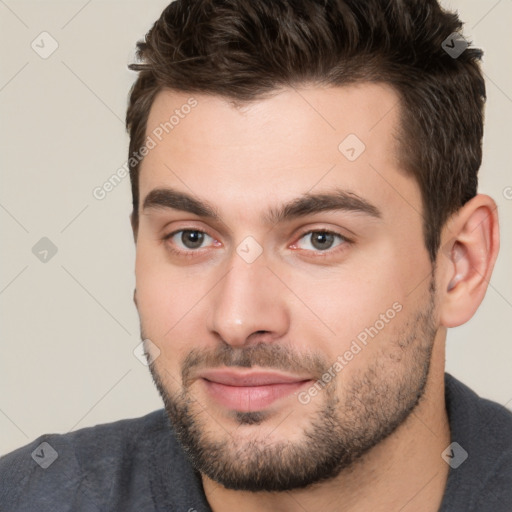 Neutral white young-adult male with short  brown hair and brown eyes