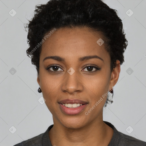 Joyful black young-adult female with short  black hair and brown eyes