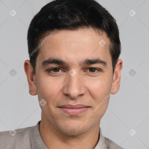 Joyful white young-adult male with short  black hair and brown eyes