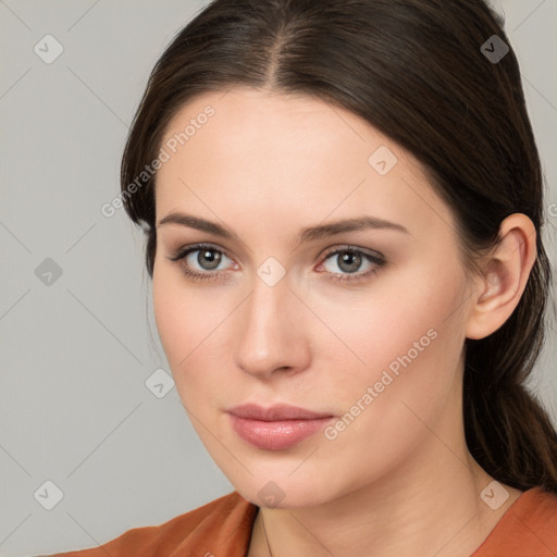 Neutral white young-adult female with medium  brown hair and brown eyes