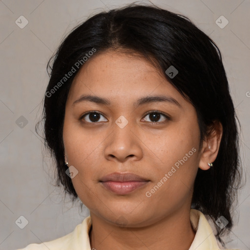 Joyful asian young-adult female with medium  black hair and brown eyes