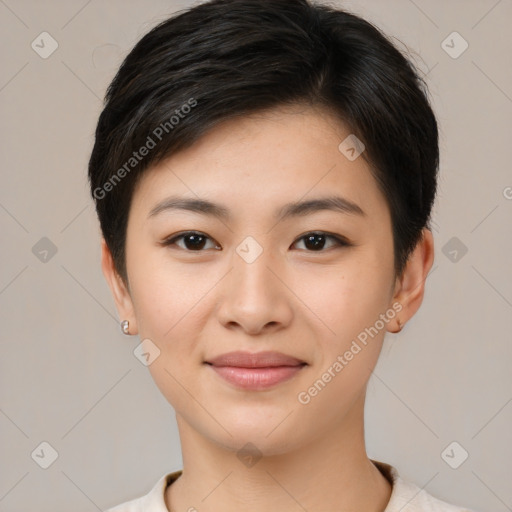 Joyful asian young-adult female with short  brown hair and brown eyes