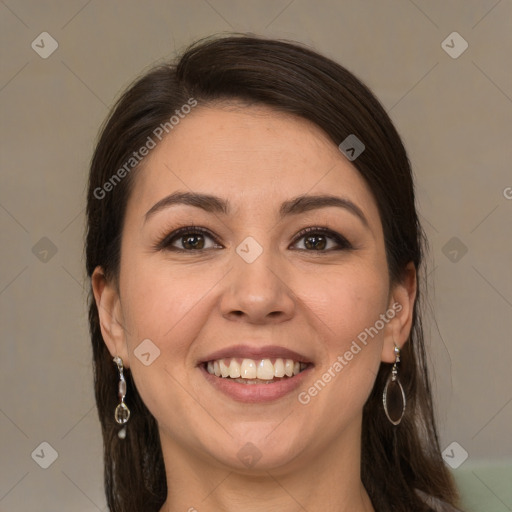 Joyful white young-adult female with long  brown hair and brown eyes