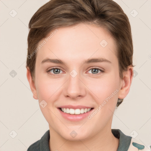 Joyful white young-adult female with short  brown hair and grey eyes