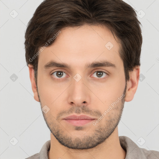 Neutral white young-adult male with short  brown hair and brown eyes