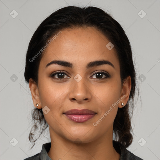 Joyful latino young-adult female with medium  brown hair and brown eyes