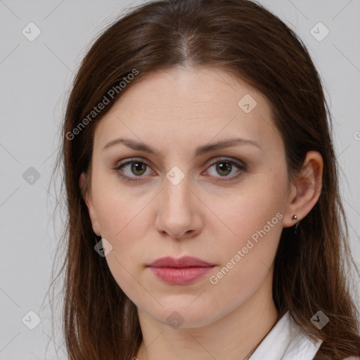 Neutral white young-adult female with long  brown hair and brown eyes