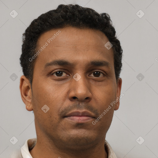 Neutral black young-adult male with short  brown hair and brown eyes