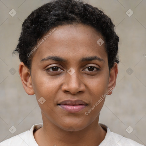 Joyful black young-adult female with short  brown hair and brown eyes