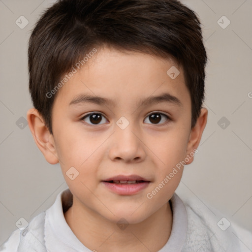 Joyful white child male with short  brown hair and brown eyes