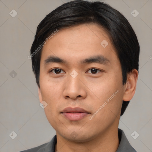 Neutral asian young-adult male with short  black hair and brown eyes