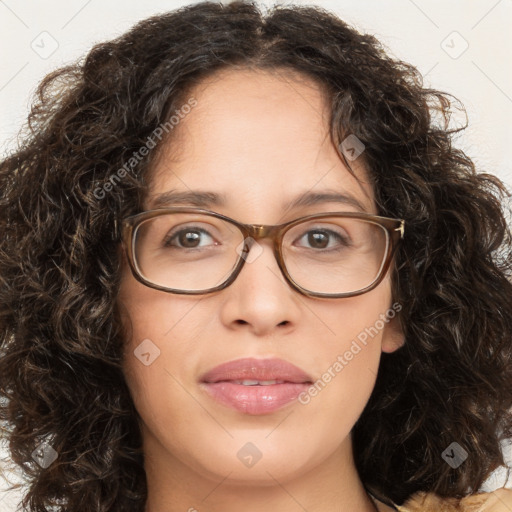 Joyful white adult female with long  brown hair and brown eyes