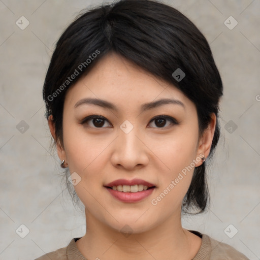 Joyful asian young-adult female with medium  black hair and brown eyes