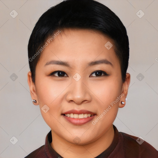 Joyful asian young-adult female with short  black hair and brown eyes