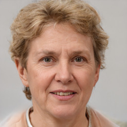 Joyful white middle-aged female with short  brown hair and brown eyes