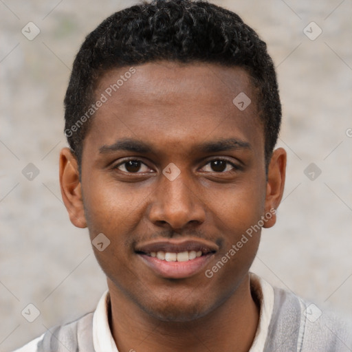 Joyful black young-adult male with short  brown hair and brown eyes