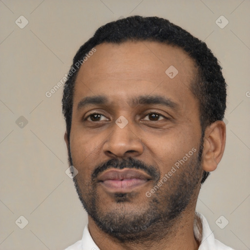 Neutral latino young-adult male with short  black hair and brown eyes