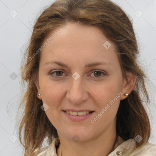 Joyful white adult female with medium  brown hair and brown eyes