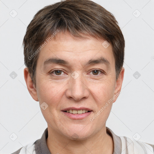 Joyful white adult male with short  brown hair and grey eyes