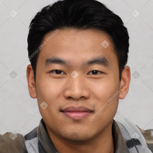 Joyful asian young-adult male with short  black hair and brown eyes