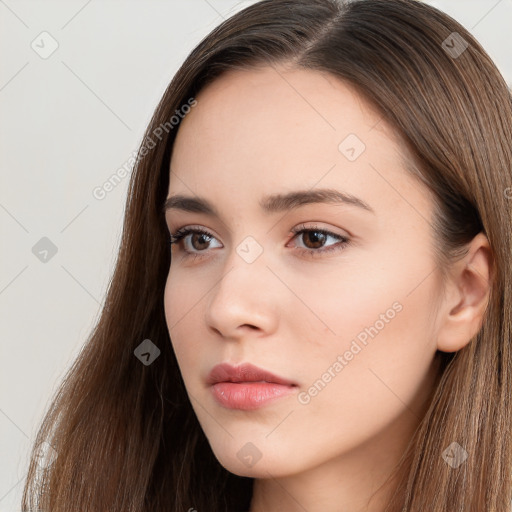 Neutral white young-adult female with long  brown hair and brown eyes