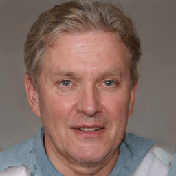 Joyful white middle-aged male with short  brown hair and brown eyes