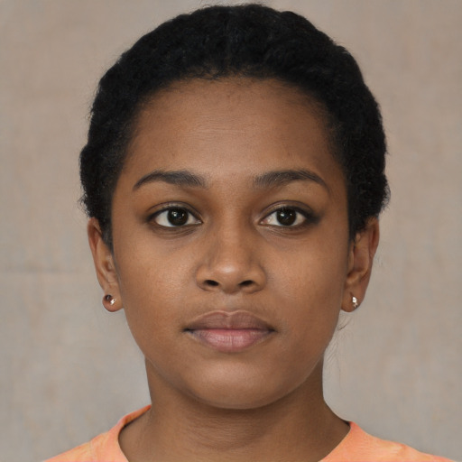 Neutral black young-adult female with short  black hair and brown eyes
