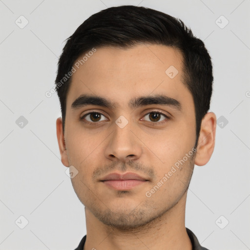 Neutral latino young-adult male with short  black hair and brown eyes