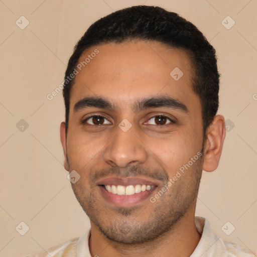 Joyful latino young-adult male with short  black hair and brown eyes
