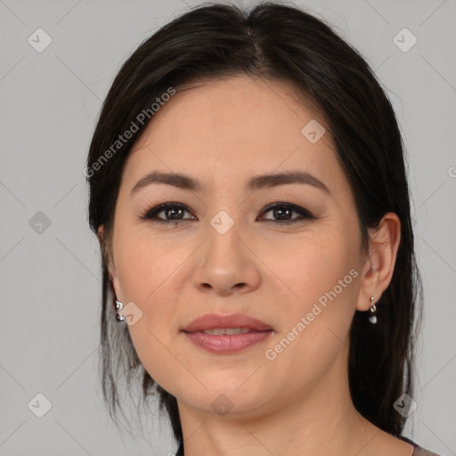 Joyful asian young-adult female with medium  brown hair and brown eyes