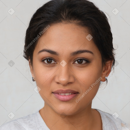 Joyful latino young-adult female with short  brown hair and brown eyes