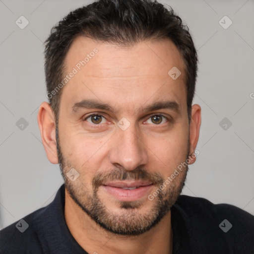 Joyful white adult male with short  brown hair and brown eyes