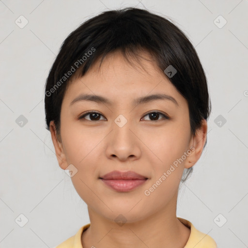 Joyful asian young-adult female with short  brown hair and brown eyes