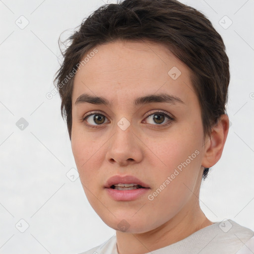 Neutral white young-adult female with short  brown hair and brown eyes