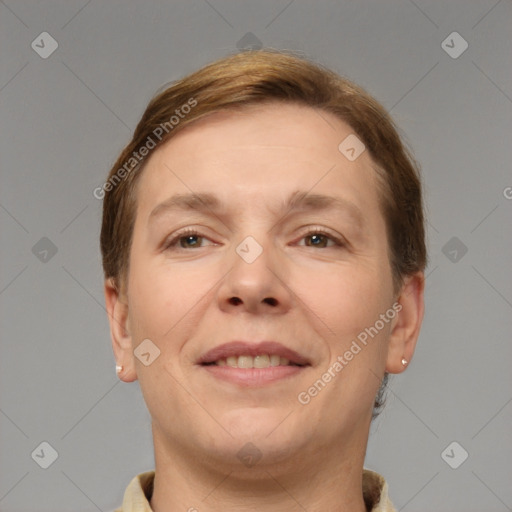 Joyful white adult female with short  brown hair and brown eyes