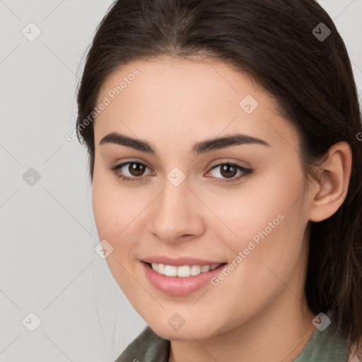 Joyful white young-adult female with medium  brown hair and brown eyes