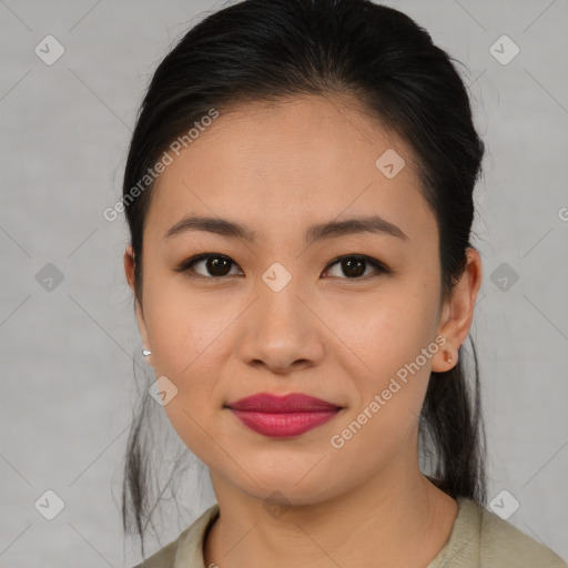 Joyful asian young-adult female with medium  brown hair and brown eyes