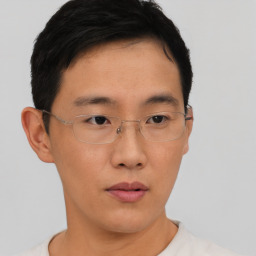 Neutral asian young-adult male with short  brown hair and brown eyes