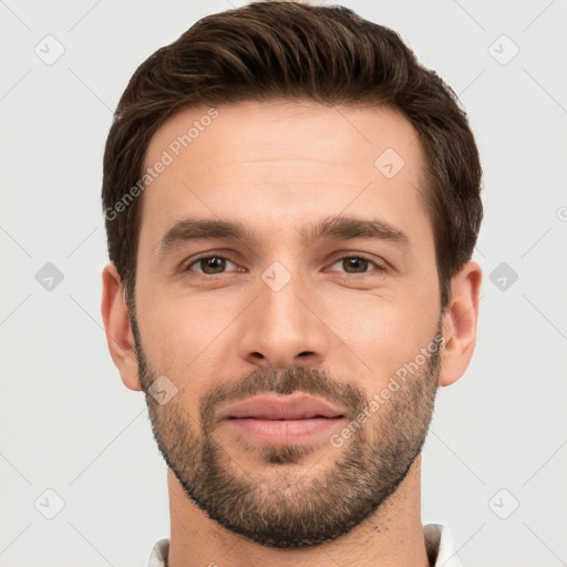 Joyful white young-adult male with short  brown hair and brown eyes