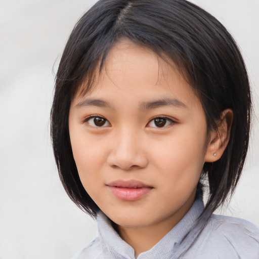 Neutral asian child female with medium  brown hair and brown eyes