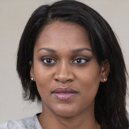 Joyful asian young-adult female with medium  black hair and brown eyes