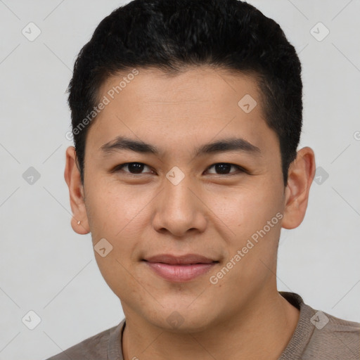 Joyful asian young-adult male with short  black hair and brown eyes