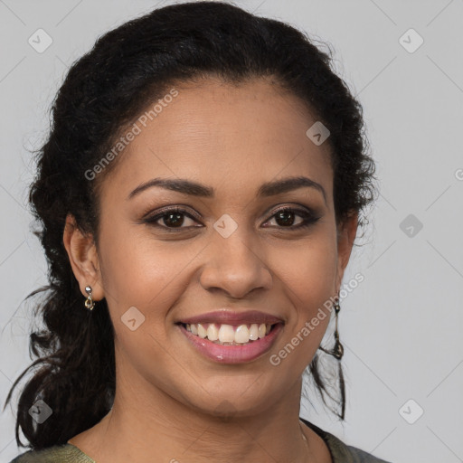 Joyful latino young-adult female with long  brown hair and brown eyes