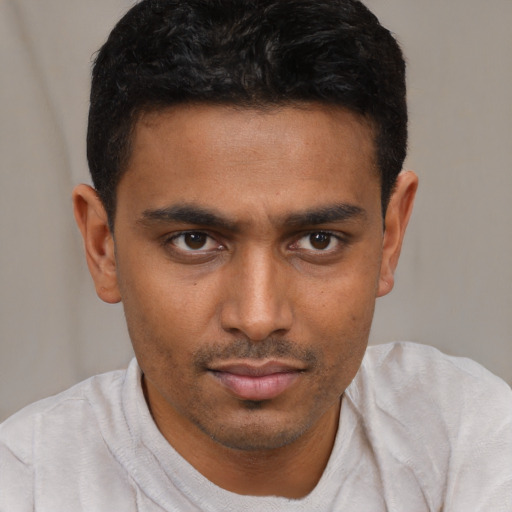 Neutral latino young-adult male with short  brown hair and brown eyes