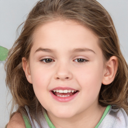 Joyful white child female with medium  brown hair and brown eyes